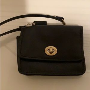 Black Turnlock Coach crossbody bag